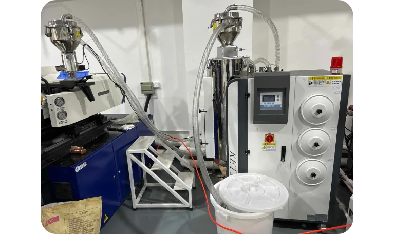 external dehumidifying polymer dryer alternative to in-barrel drying