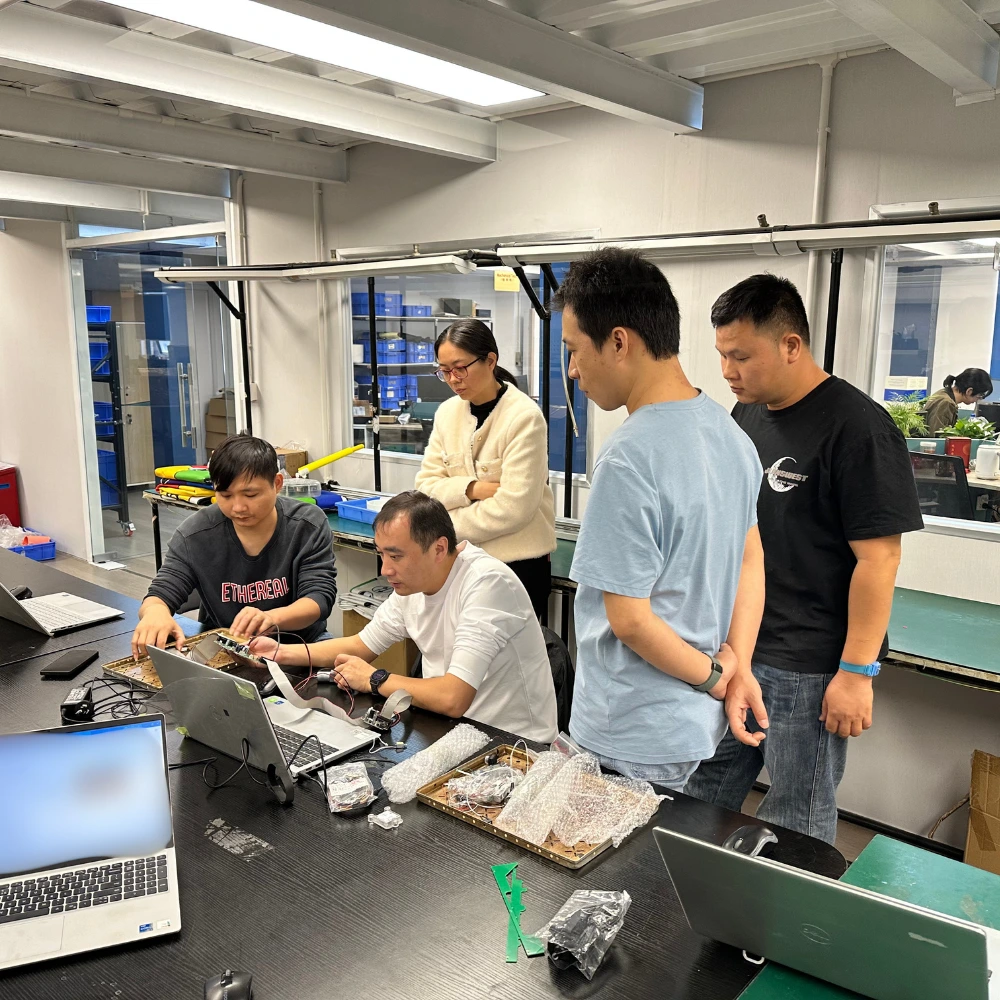 engineers reviewing proof of concept - initial prototypes